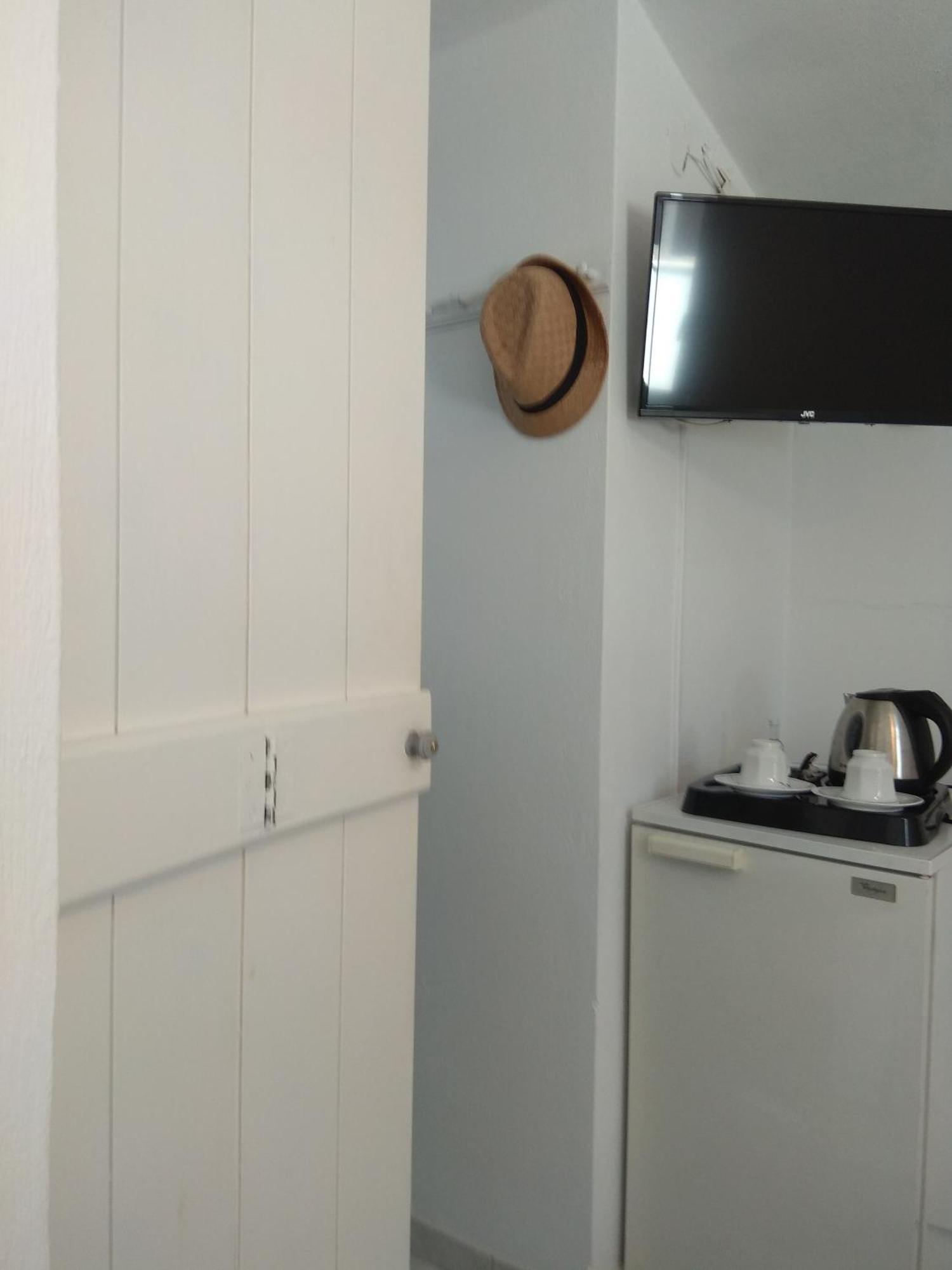 Kamara Tinos Quarto foto